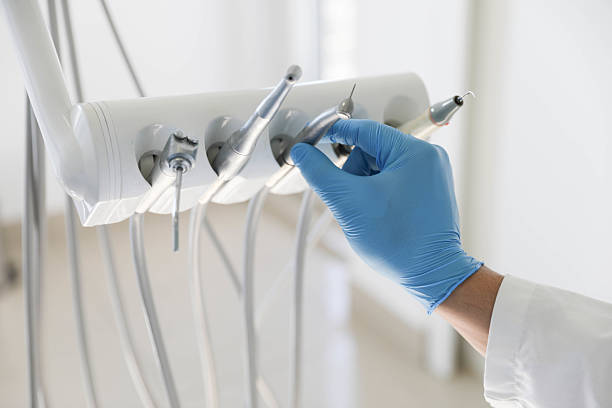 Professional Tooth Extraction technician working in Edwardsville, KS